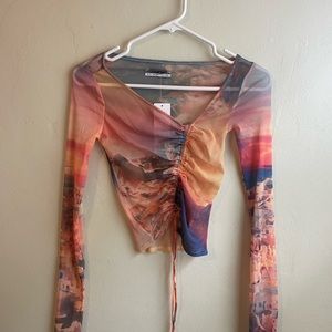 Urban outfitters going out top. Never worn new with tags! Mesh long sleeve
